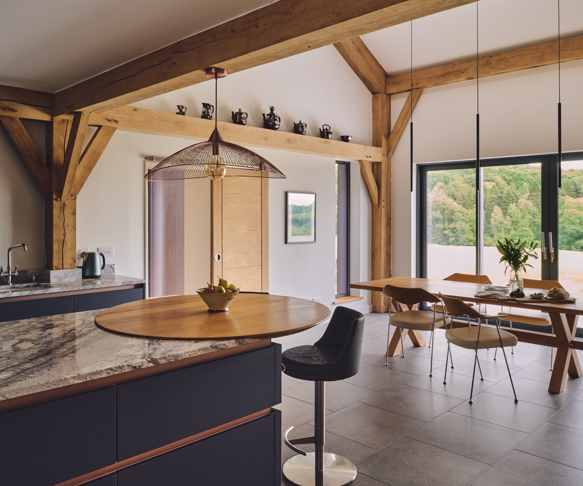 Open plan kitchen-diner with oak frame