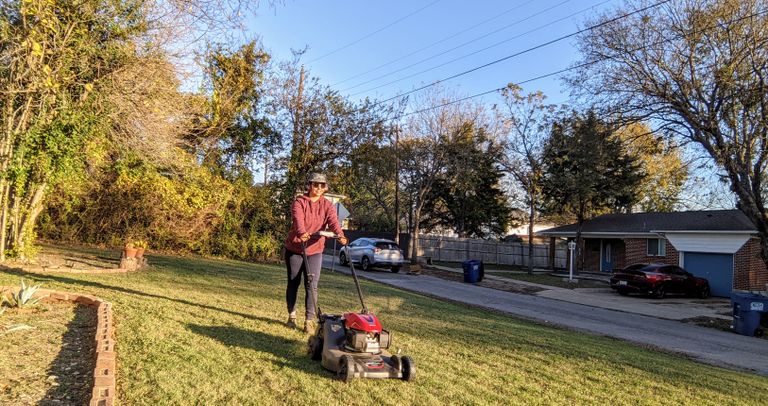 Honda HRN216VKA lawn mower on front yard