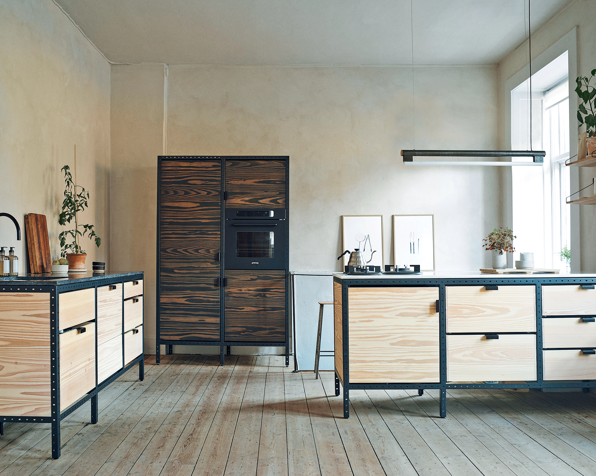 A wooden freestanding kitchen with black edging