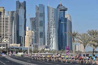 The peloton approaches Doha City