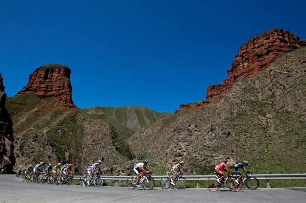 The riders make their way up the first climb of the day.