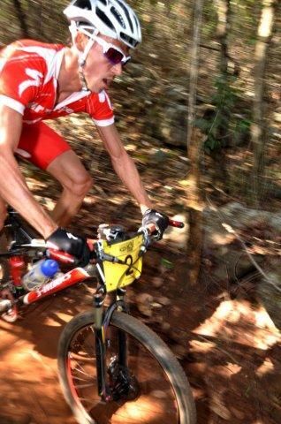 Melt Swanepoel winds his way through some singletrack.