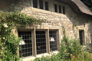 Thacthed cottage leaded light windows