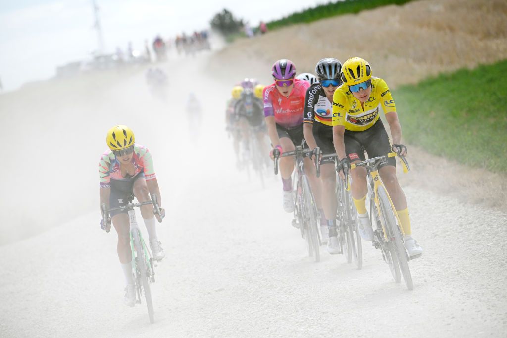 BARSURAUBE FRANCE JULY 27 LR Katarzyna Niewiadoma of Poland and Team CanyonSRAM Racing Marlen Reusser of Switzerland and Team SD Worx Liane Lippert of Germany and Team DSM Women and Marianne Vos of Netherlands and Jumbo Visma Women Team yellow leader jersey compete through gravel roads during the 1st Tour de France Femmes 2022 Stage 4 a 1268km stage from Troyes to BarSurAube TDFF UCIWWT on July 27 2022 in BarsurAube France Photo by Bernard Papon PoolGetty Images