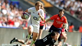 Abby Dow of England breaks clear of Katelyn Vahaakolo to score their second try during the Women's International match between England Red Roses and New Zealand Black Ferns at Allianz Twickenham Stadium on September 14, 2024 in London, England. 