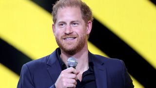 Prince Harry talking on stage at Invictus Games
