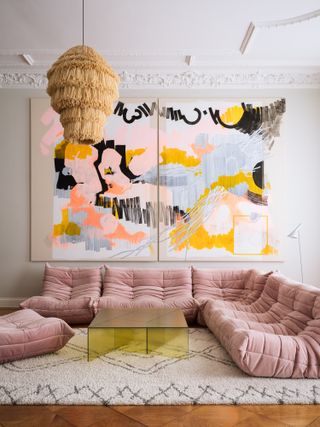 Pink slouchy sectional sofa in living room