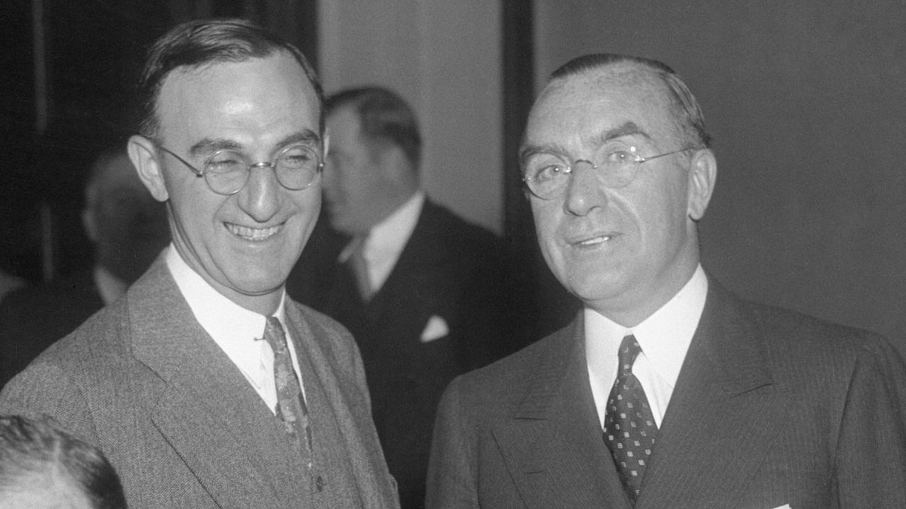 Michael Meehan (right) with his lawyer at an SEC hearing