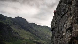 Anna heads up a route in Wales as the weather closes in