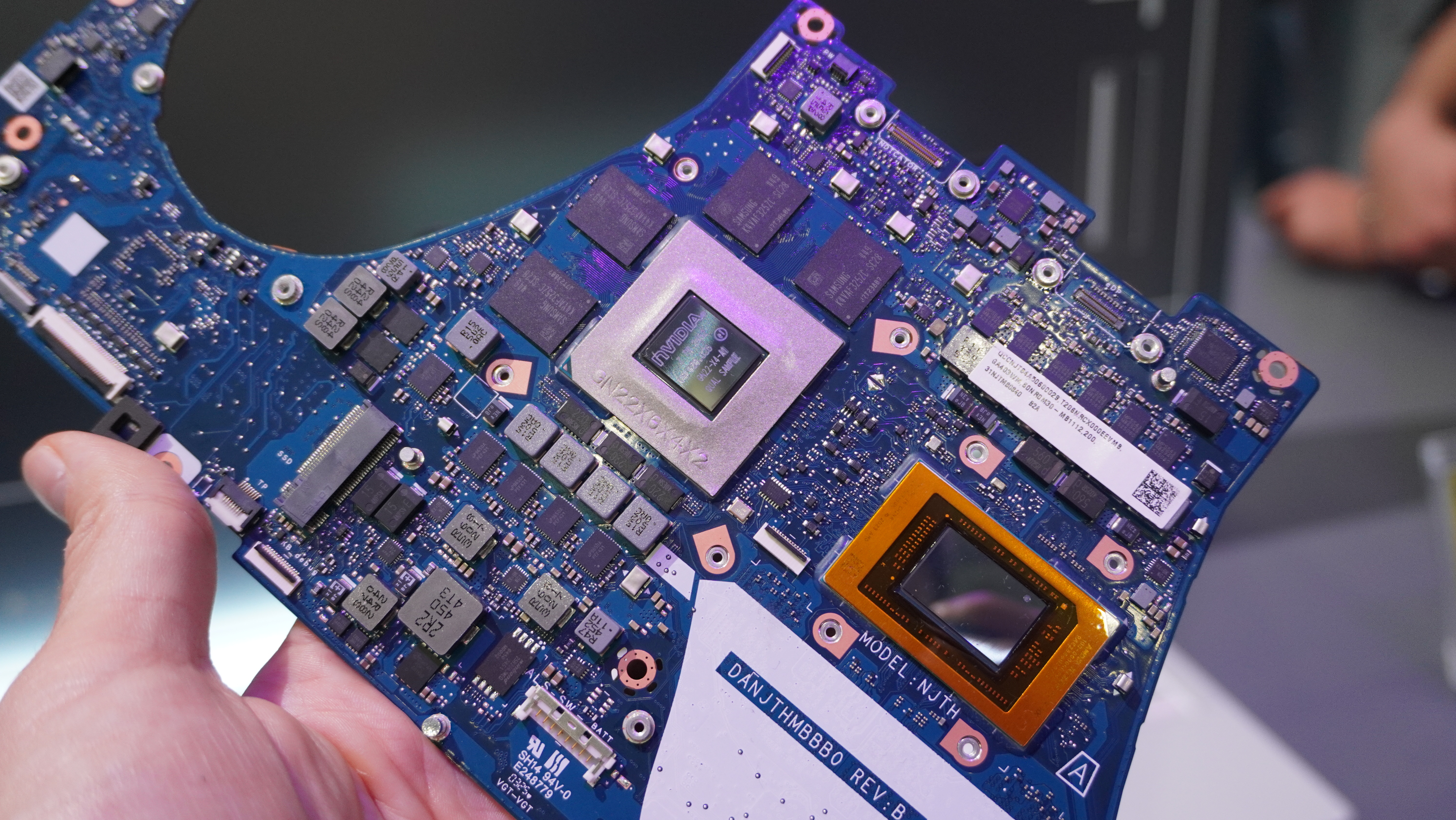 Asus ROG Zephyrus G14 motherboards in hand