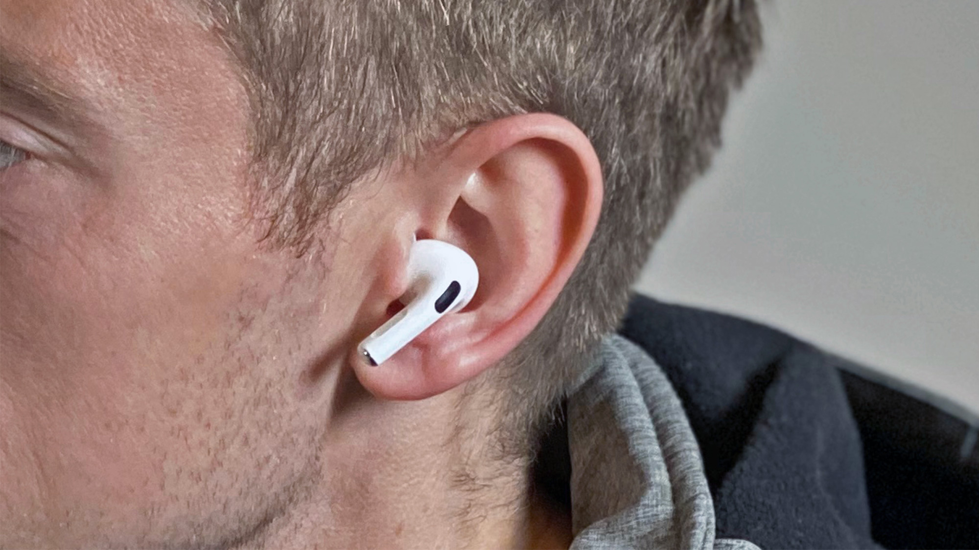 a closeup of the AirPods Pro in someone's ear