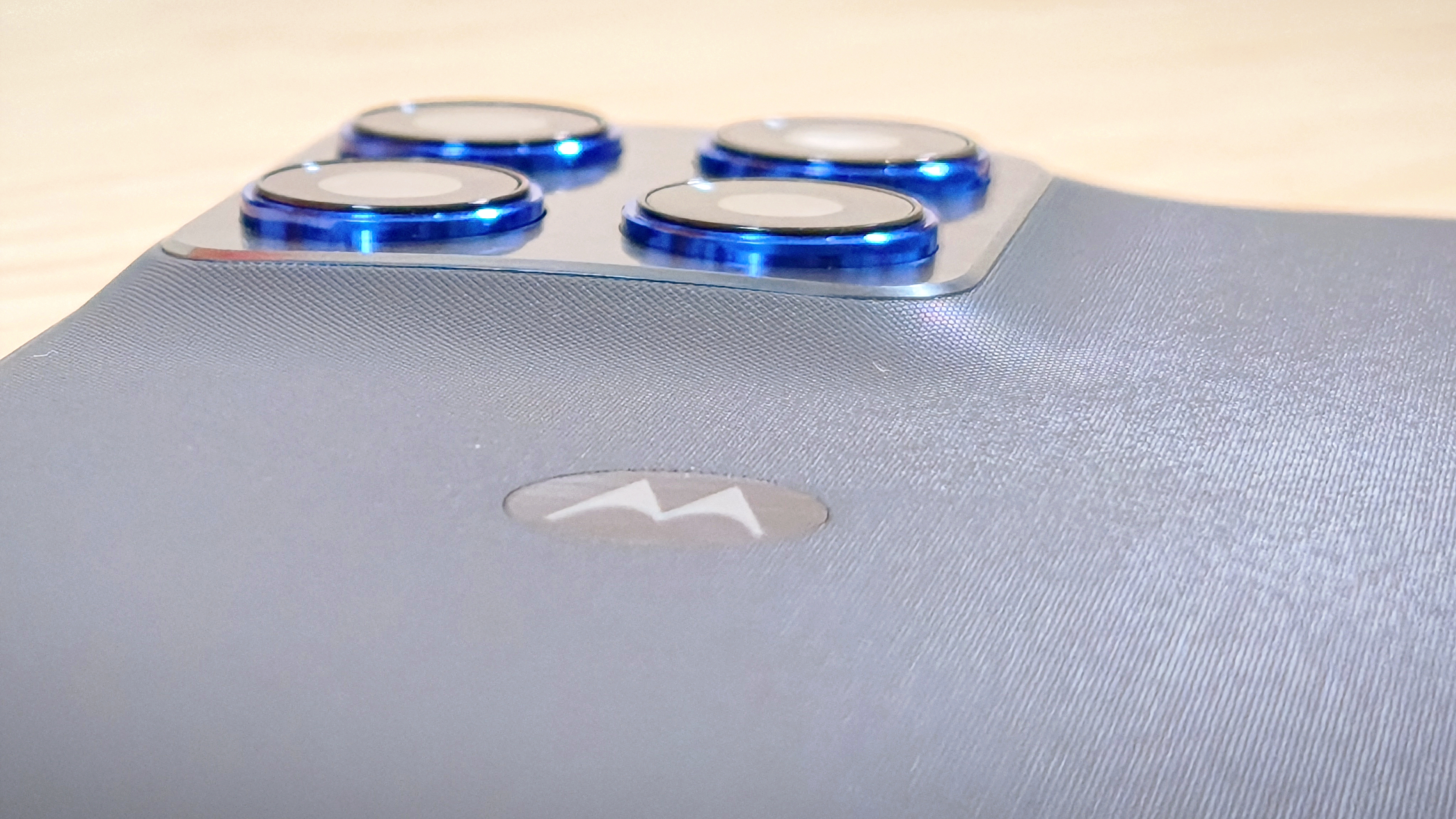 Motorola Edge 70 phone on a wooden desk