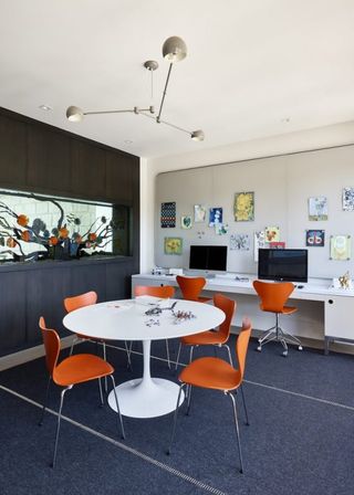 kids desk space with aquarium wall