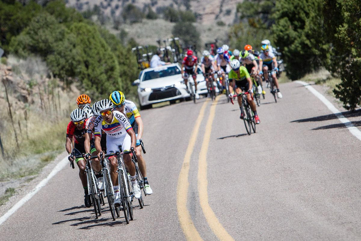 The front group begins to separate on the long climb from the Clif Dwellings