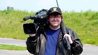 Michael Moore directs Bowling for Columbine