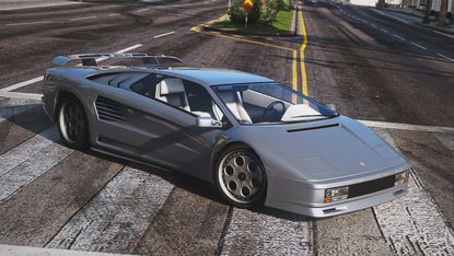 GTA 5 running on PS5, a silver sports car is depicted on a grey road without a driver behind the wheel