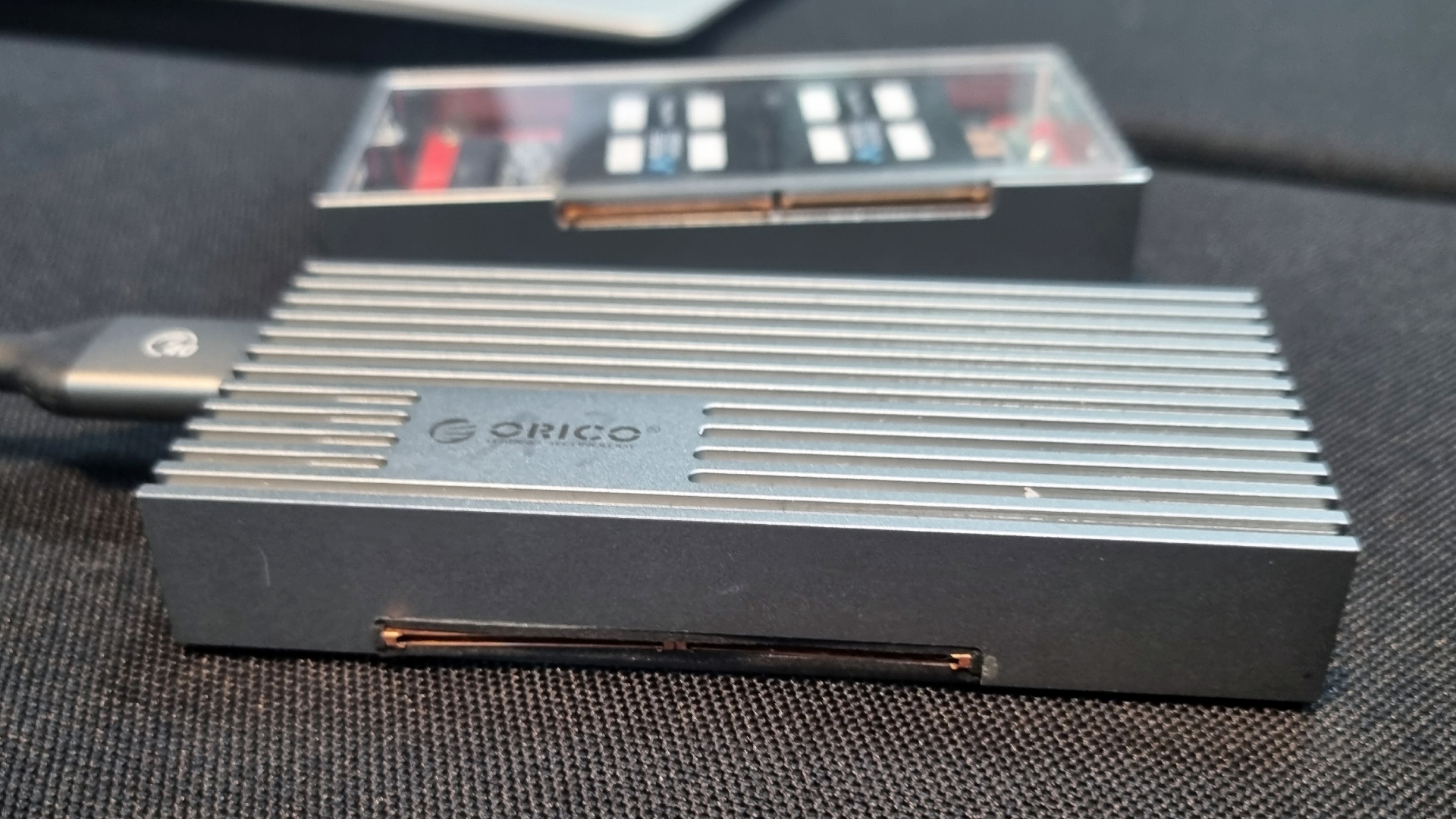 A prototype external SSD enclosure fitted with two Frore Airjet Mini Slims