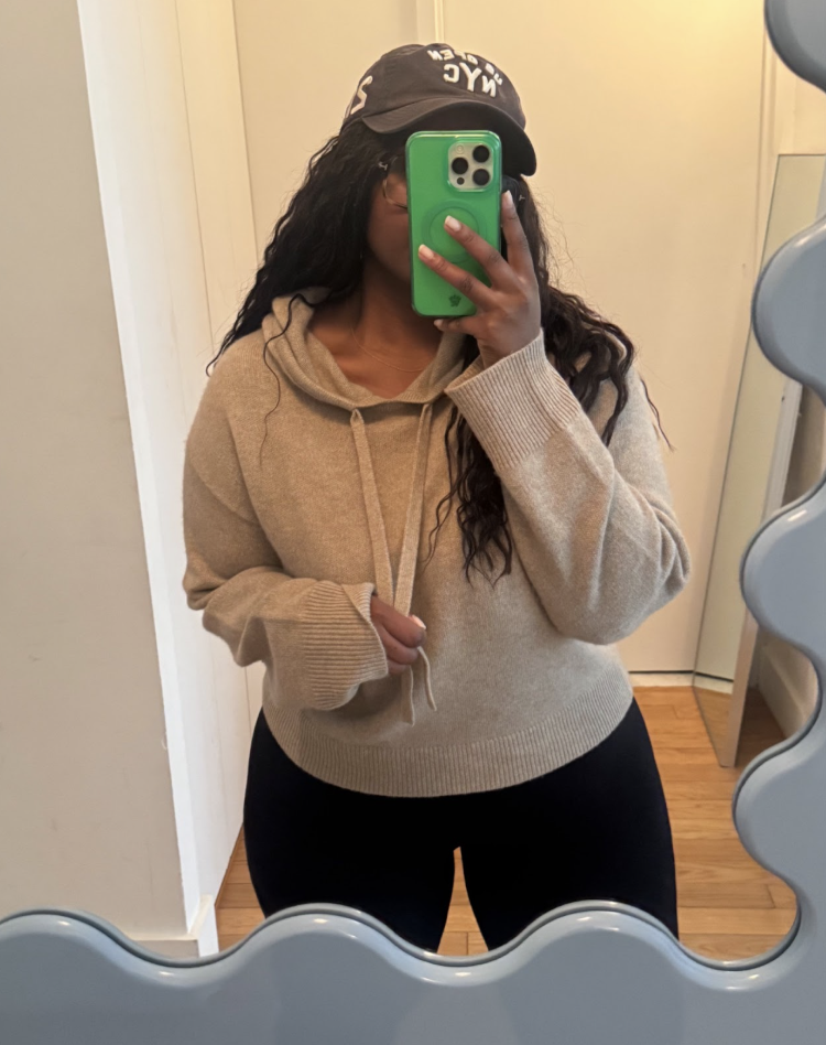 Tariro Makoni wearing a cashmere sweatshirt