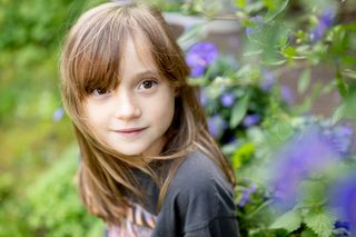 Portrait of girl in garden shot with Nikon Z 50mm f/1.8 S at f/1.8