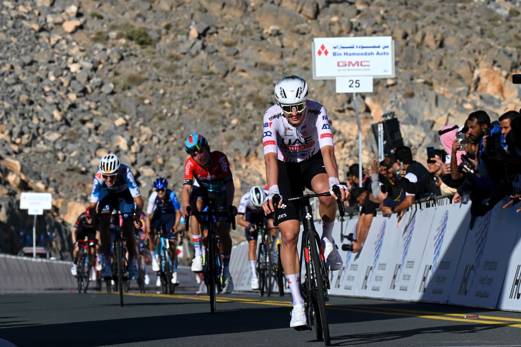 JEBEL JAIS UNITED ARAB EMIRATES FEBRUARY 21 Jay Vine of Australia and Team UAE Emirates crosses the finish line during the 6th UAE Tour 2024 Stage 3 a 176km stage from Al Marjan Island Al Jazirah Al Hamra to Jebel Jais 1489m UCIWT on February 21 2024 in Jebel Jais United Arab Emirates Photo by Tim de WaeleGetty Images
