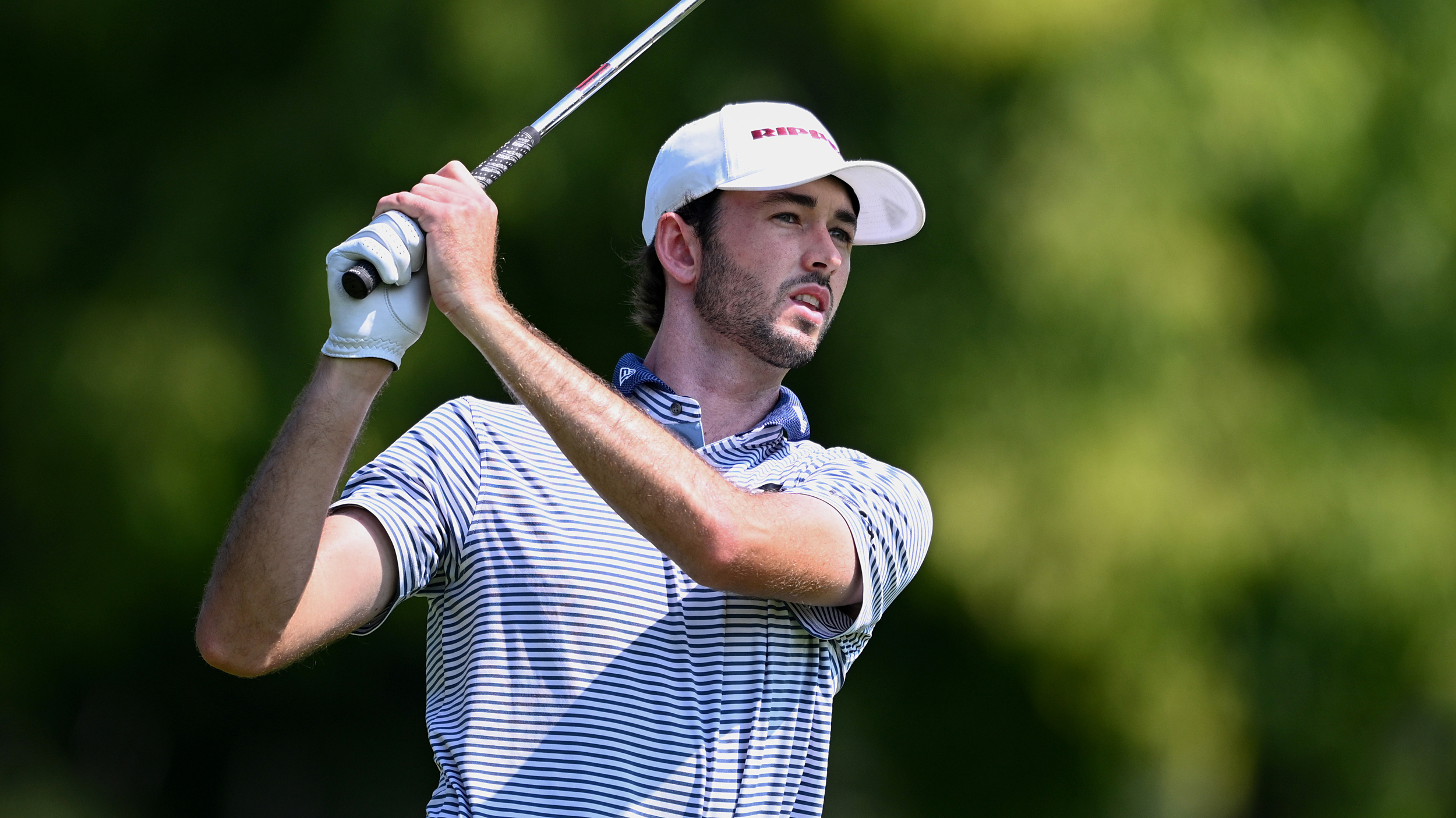 Elvis Smylie holds his finish on an iron shot