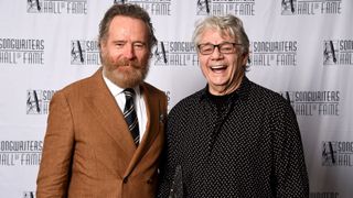 Bryan Cranston (left) and Inductee Steve Miller pose backstage at the Songwriters Hall of Fame 51st Annual Induction and Awards Gala at Marriott Marquis on June 16, 2022 in New York City.