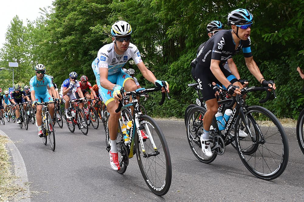 Fabio Aru alongside Richie Porte in the peloton