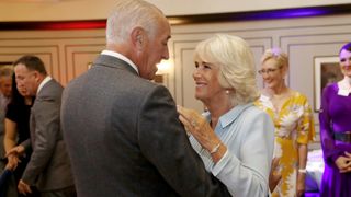 Camilla, Duchess of Cornwall dances with Len Goodman during a dance performances organized by the British Dance Council in association with The Royal Osteoporosis Society at Carisbrooke Hall on September 05, 2019 in London, England. HRH is the Patron-in-Chief of the Victory Services Association and President of The Royal Osteoporosis Society.