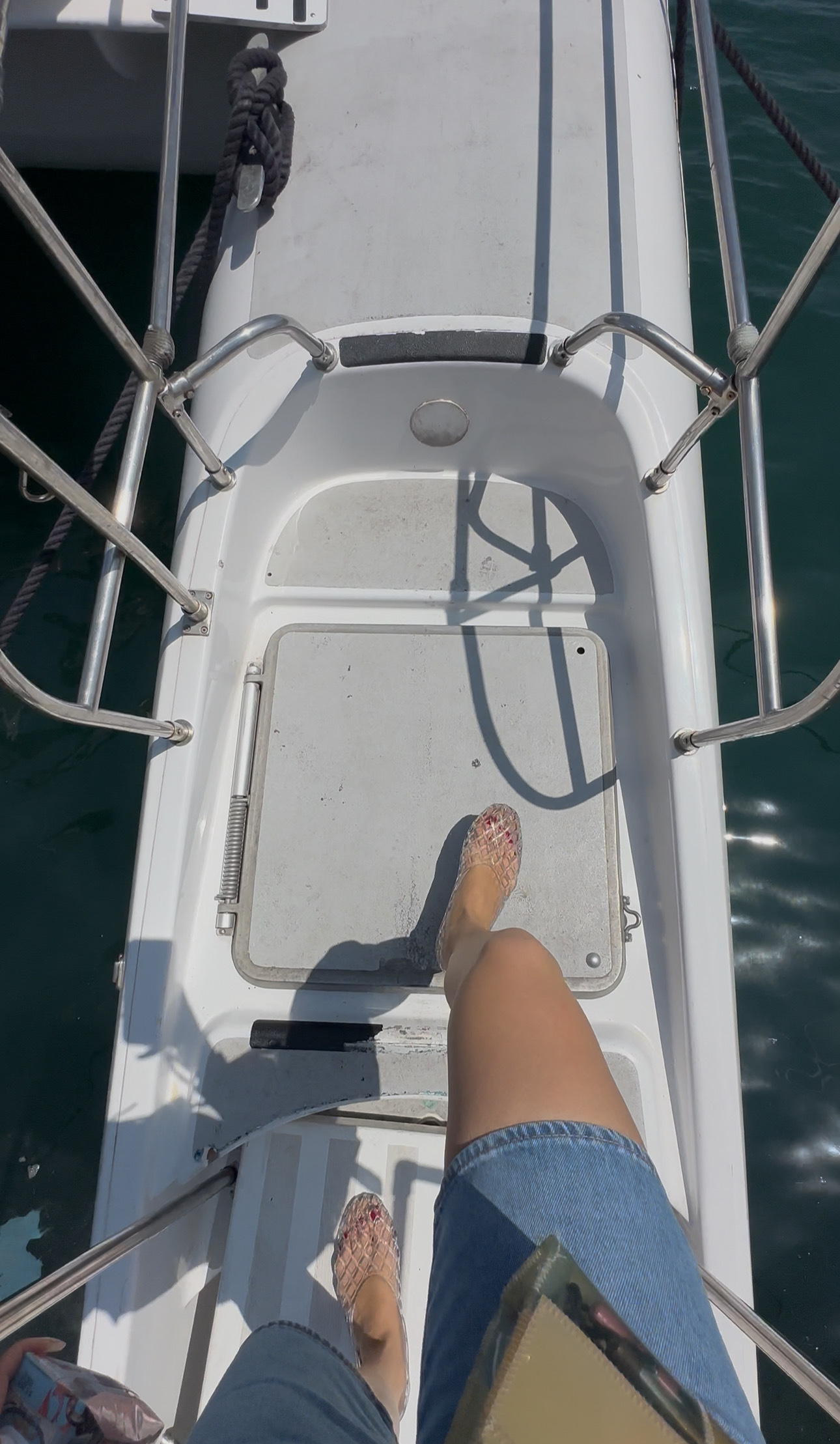 Clear jelly shoes on a boat
