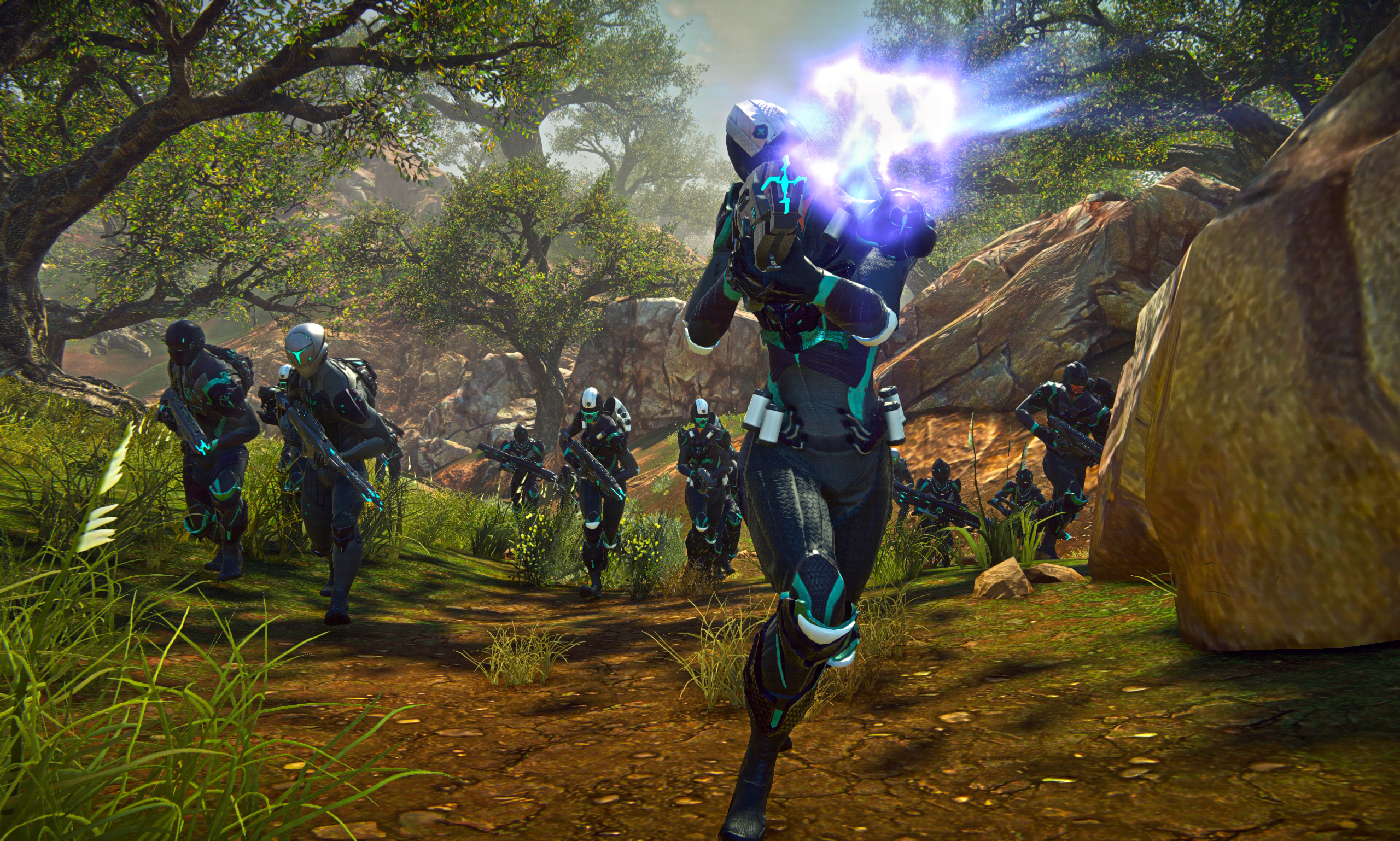 Best MMOs: Planetside 2 - Several characters with guns run through a forest.