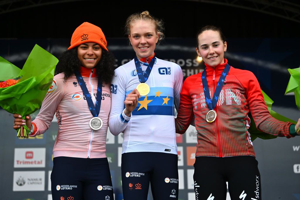NAMUR BELGIUM NOVEMBER 05 LR Silver medalist Ceylin Del Carmen Alvarado of The Netherlands gold medalist Fem Van Empel of The Netherlands and bronze medalist Blanka Vas Kata of Hungary pose on the podium during the medal ceremony after the 20th UEC European Cyclocross Championships 2022 Womens Elite EuroCross22 on November 05 2022 in Namur Belgium Photo by Luc ClaessenGetty Images