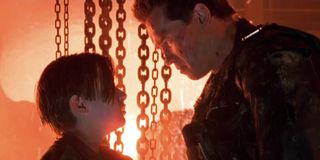 Edward Furlong and Arnold Schwarzenegger in the final scene of Terminator 2