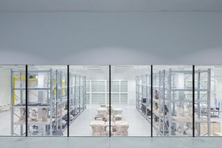 Underground space with industrial shelving for restoration and storage of museum artifacts