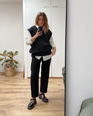 white shirt outfits: @brittanybathgate wears a white shirt with black trousers