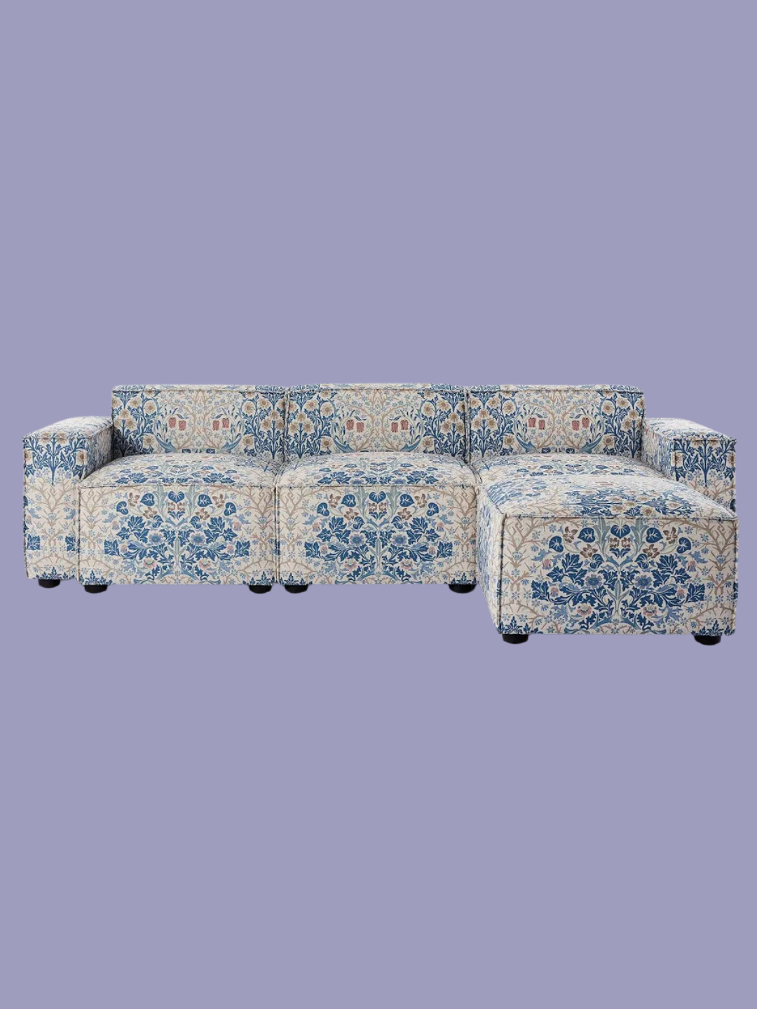 A blue and amber three-seater sofa with a chaise lounger from Swyft x Morris &amp;amp; Co.