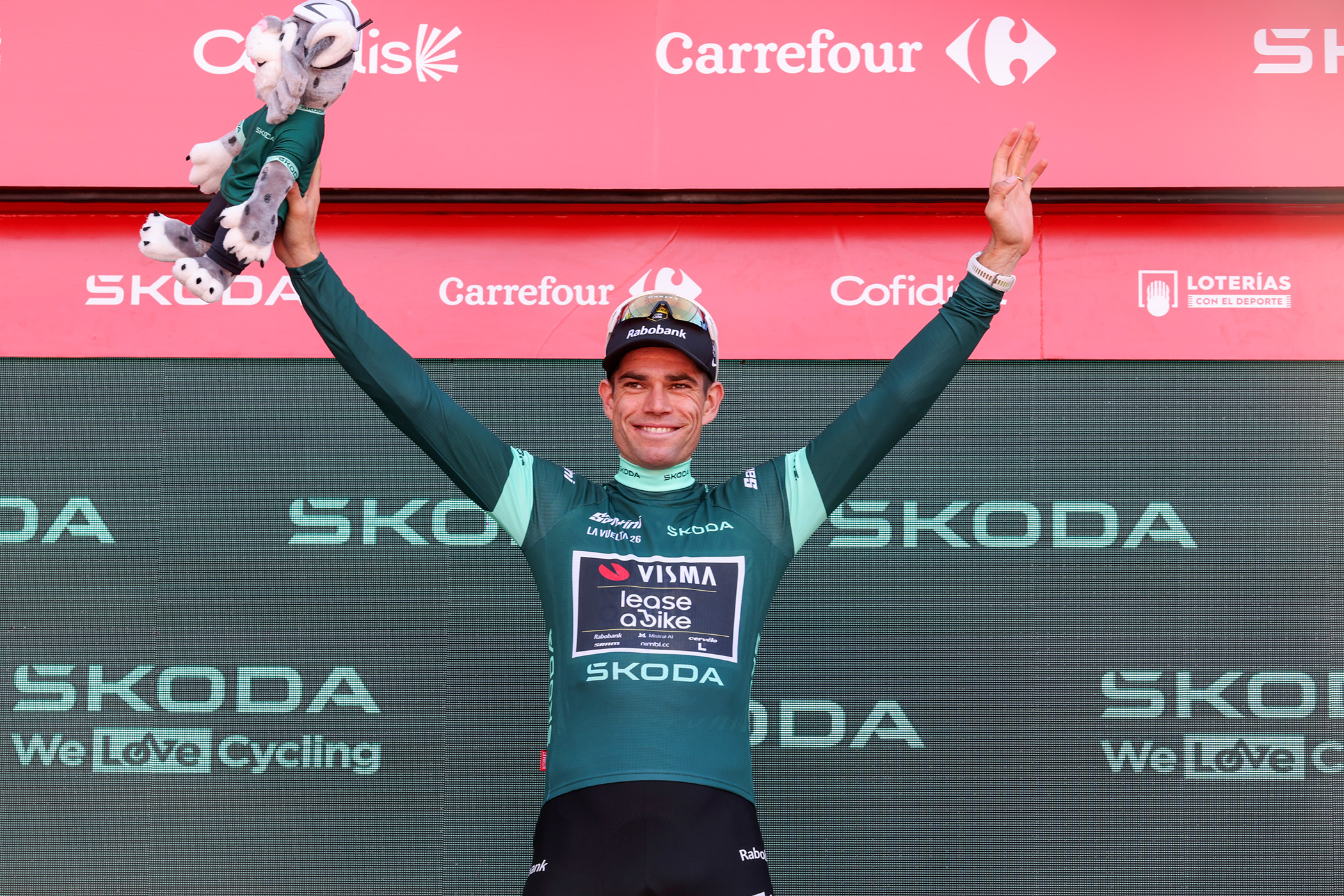 Wout van Aert on the podium in the green jersey after stage 8 of the Vuelta a Espa&amp;ntilde;a