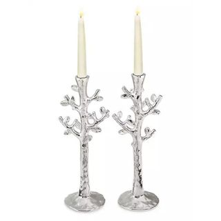 Tree of Life Candle Holders against a white background.