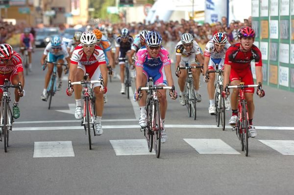 Luca Paolini, Francesco Gavazzi and Mauro Santambrogio cross the line.