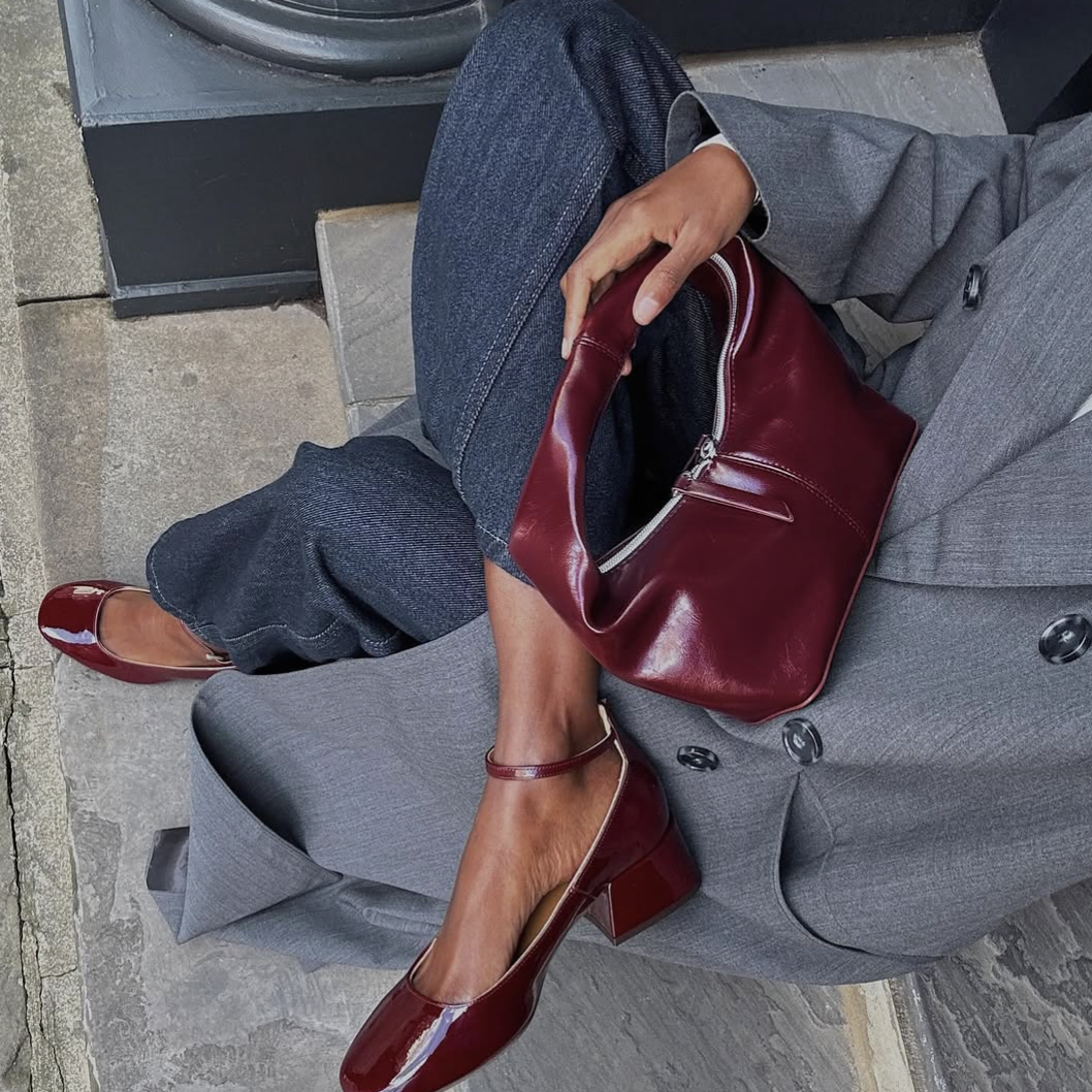 jeans with burgundy accessories