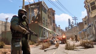 Person in hazmat suit holding gun in post apocalyptic town