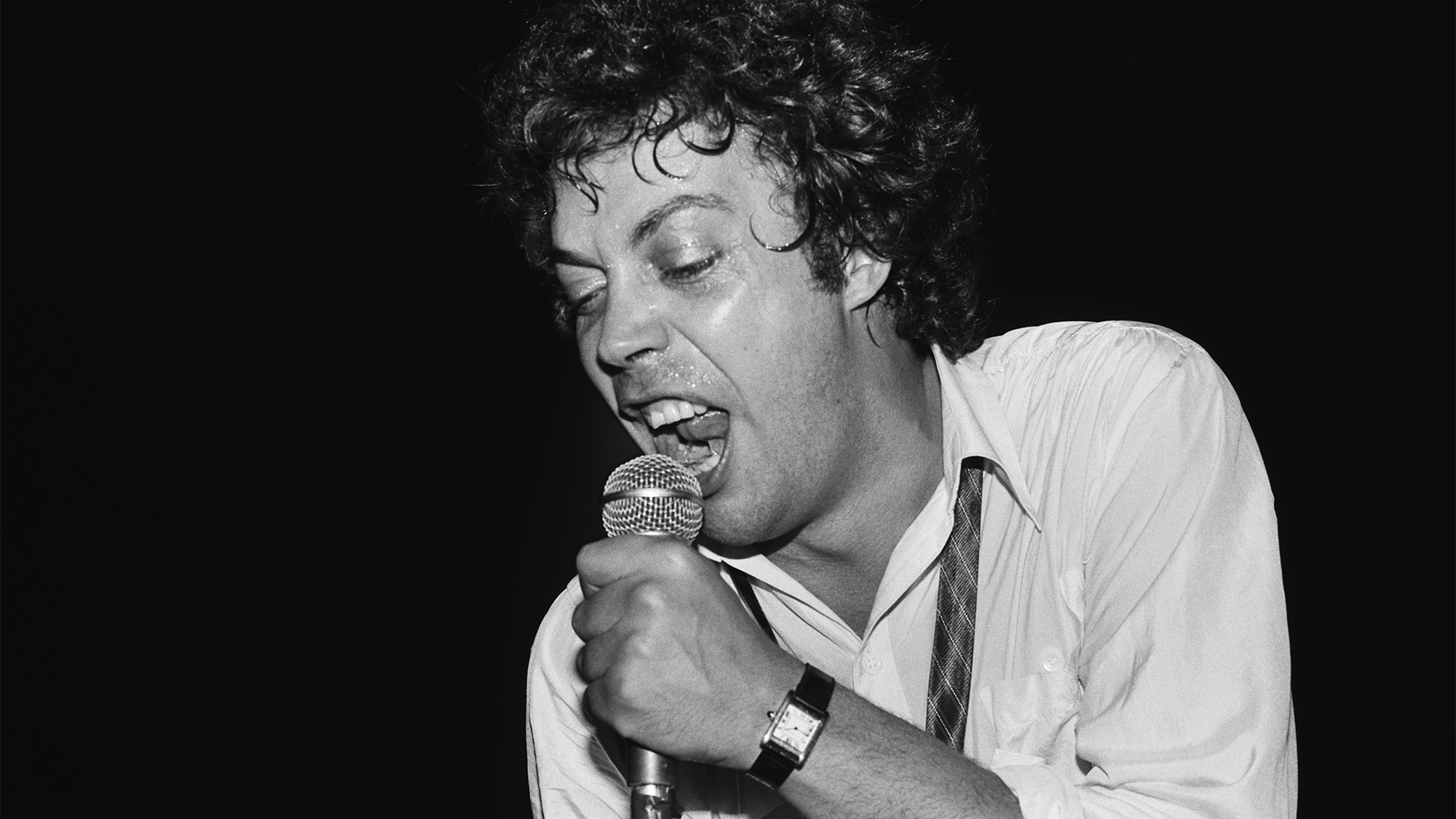 British actor and singer Tim Curry performing live, Canada, 1979.