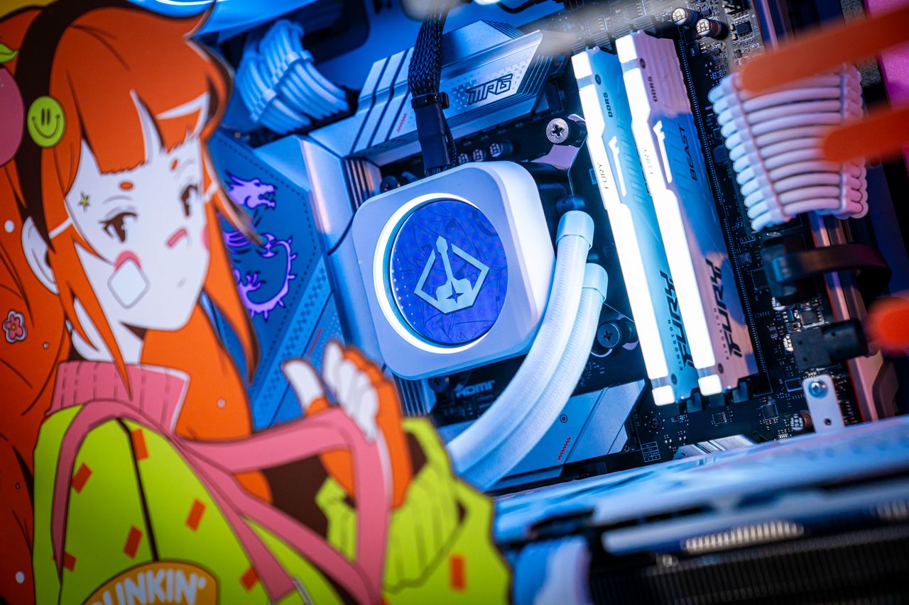 Dunkin's themed PC covered in anime girls.