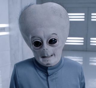Ken Hall wears a prosthetic head to portray Jeff the Grey in "People of Earth."