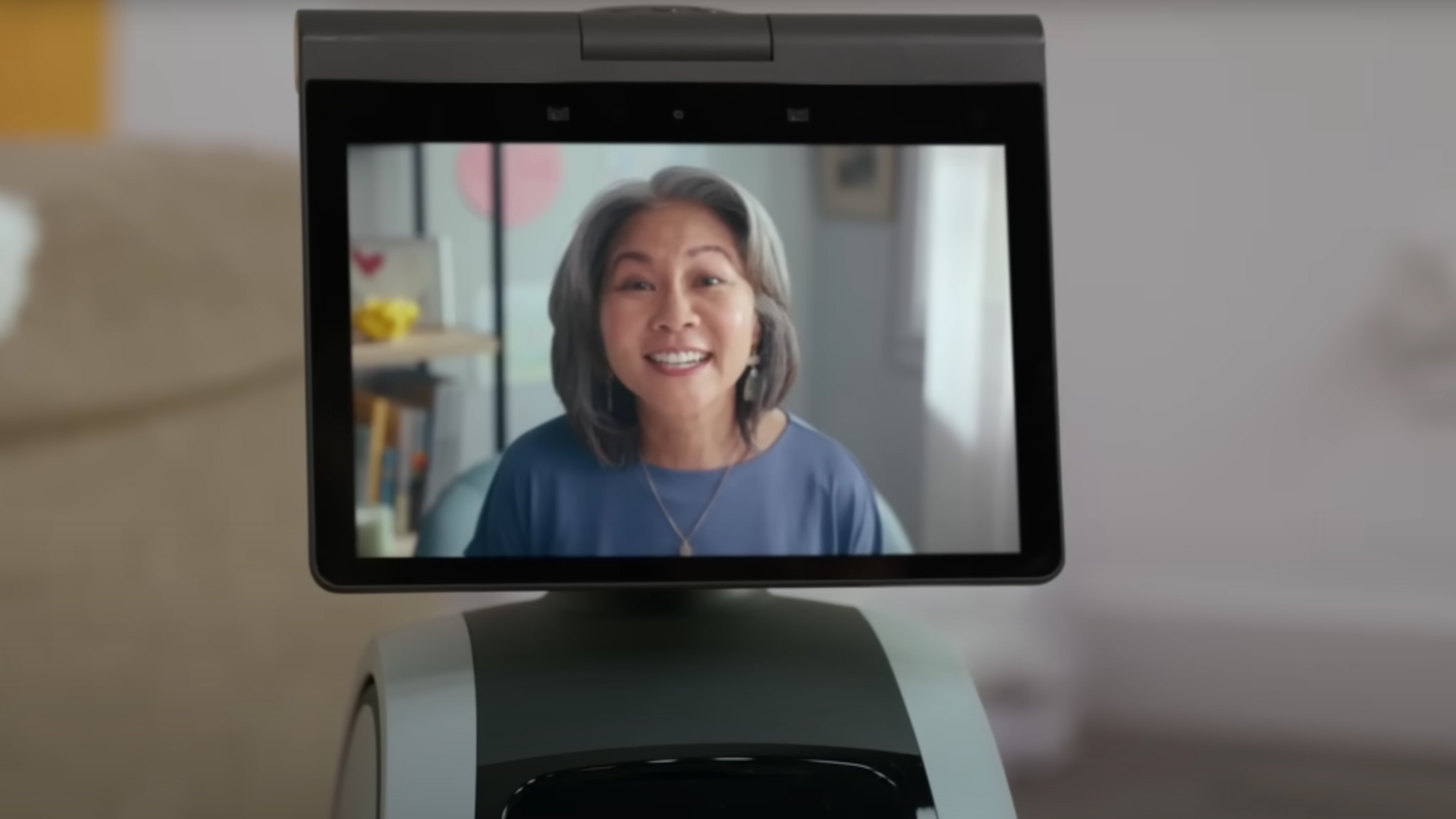 Amazon's Astro robot showing a video call on its screen