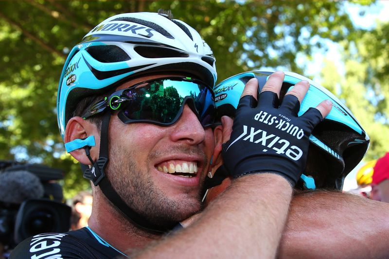 Mark Cavendish gives the head of Mark Renshaw a giant hug