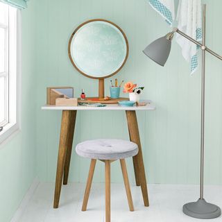dressing table with mirror and grey floor lamp