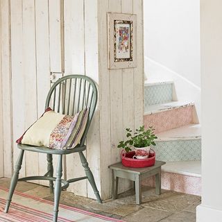 printed colour staircase wooden stool and plant in white pot