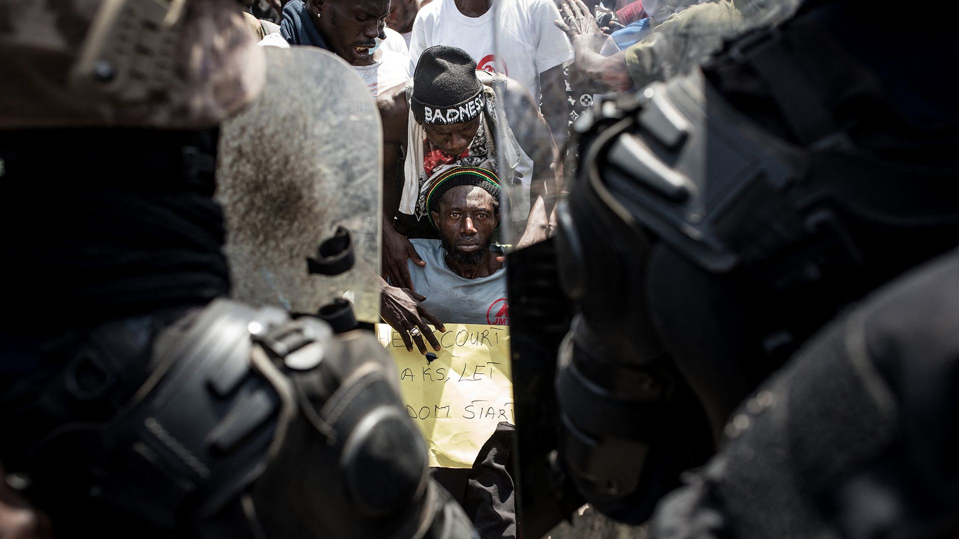 
                                Protesters face off with police while demanding the release of Ousainou and Amie Bojan, siblings acquitted of killing two police officers in Brufut, Gambia
                            