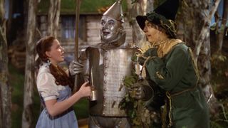 Dorothy and the Lion meet the Tin Man in The Wizard of Oz