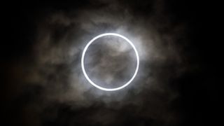 An annular eclipse seeing at Tokyo in morning of May 21, 2021, through thin clouds.